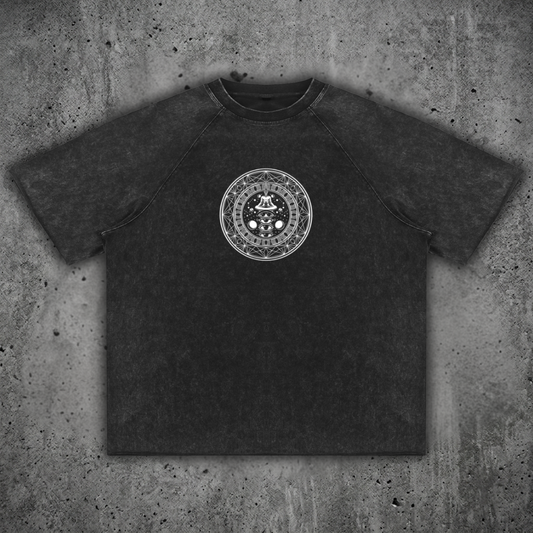 Front view of the DMT.exe 300 GSM heavy cotton raglan tee from the Sacred Collection, featuring an artisanal mineral wash and a raw edge hem.