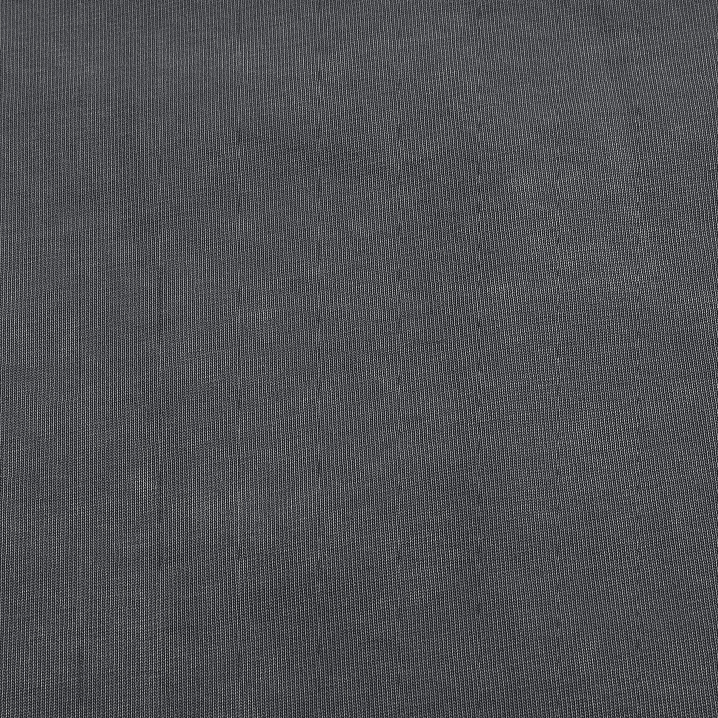 Back view of model wearing Embrace The Chaos snow wash oversized tee