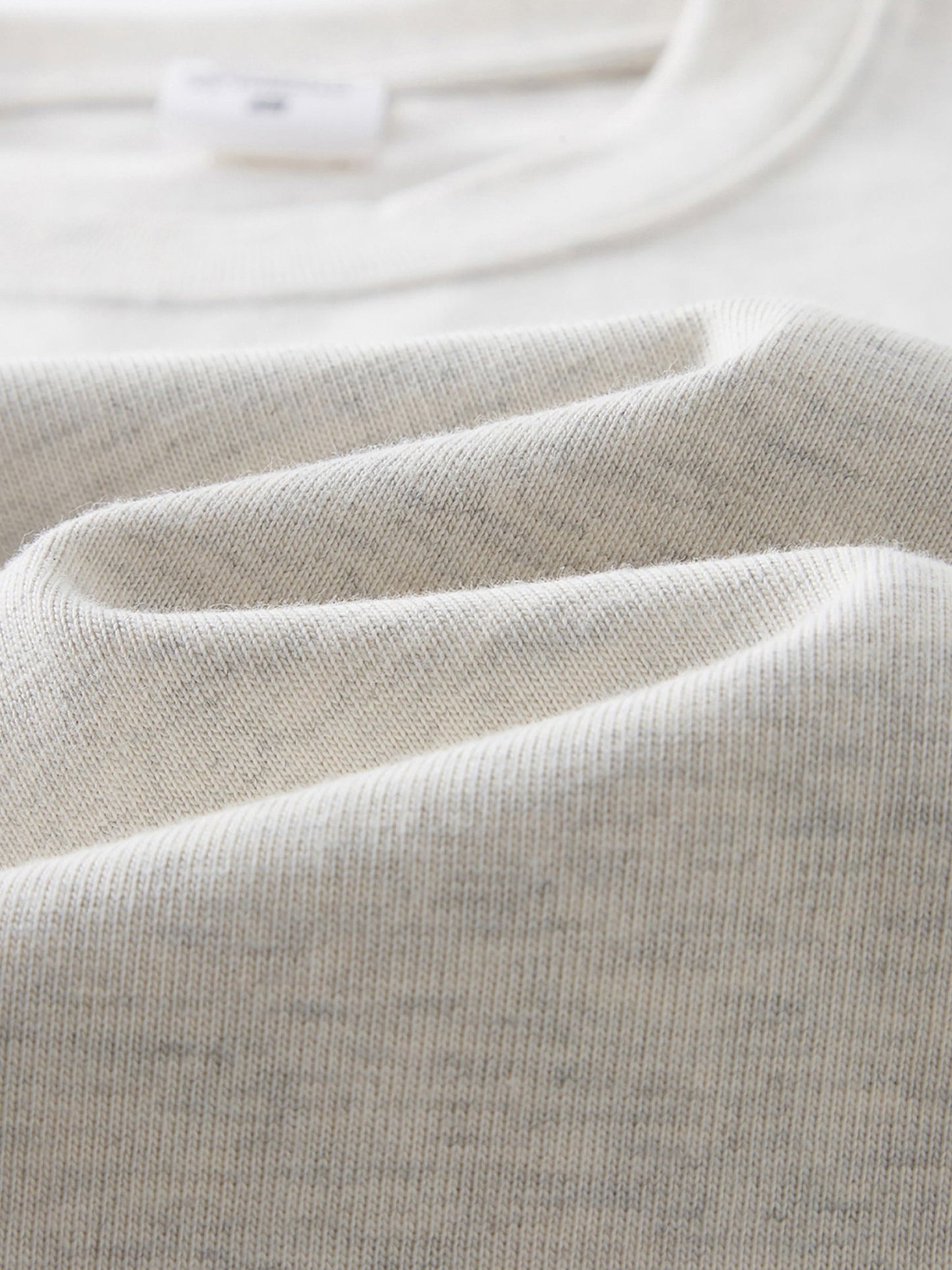 Dissolve The Ego oat gray 425 GSM tee soft fabric texture and neckline close-up