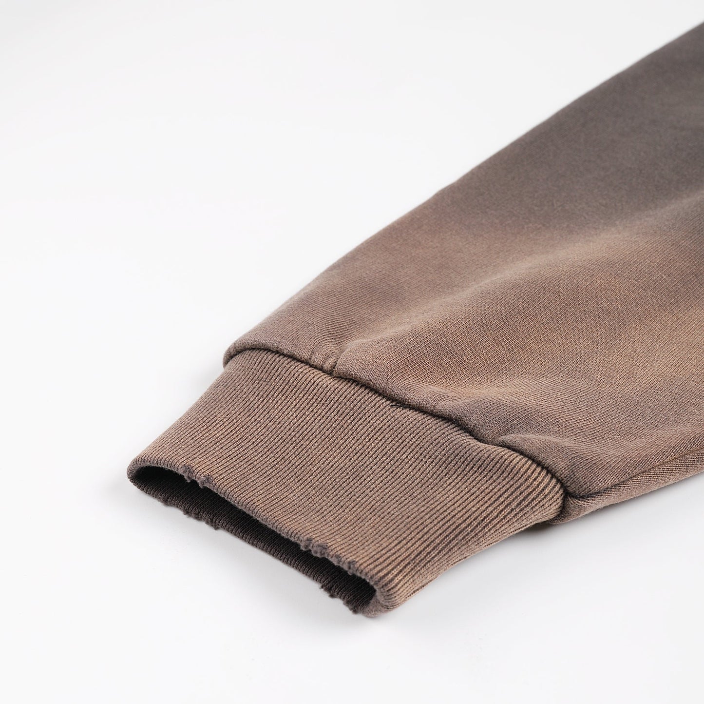 Cosmic Connection Zip Hoodie ribbed cuff detail on brown sleeve