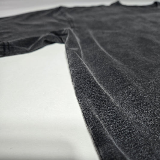 Dissolve The Ego Fluffy Vintage tee laid flat showing underarm and side panel construction