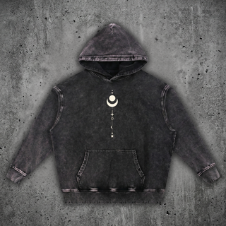 Snow-washed heavyweight hoodie in mottled black with hand-frayed edges