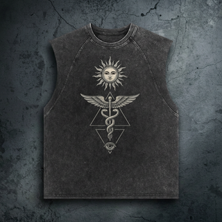 Charcoal snow wash Inner Alchemy tank top on cracked concrete, printed in cream with a radiant sun face, winged caduceus and an all-seeing eye.