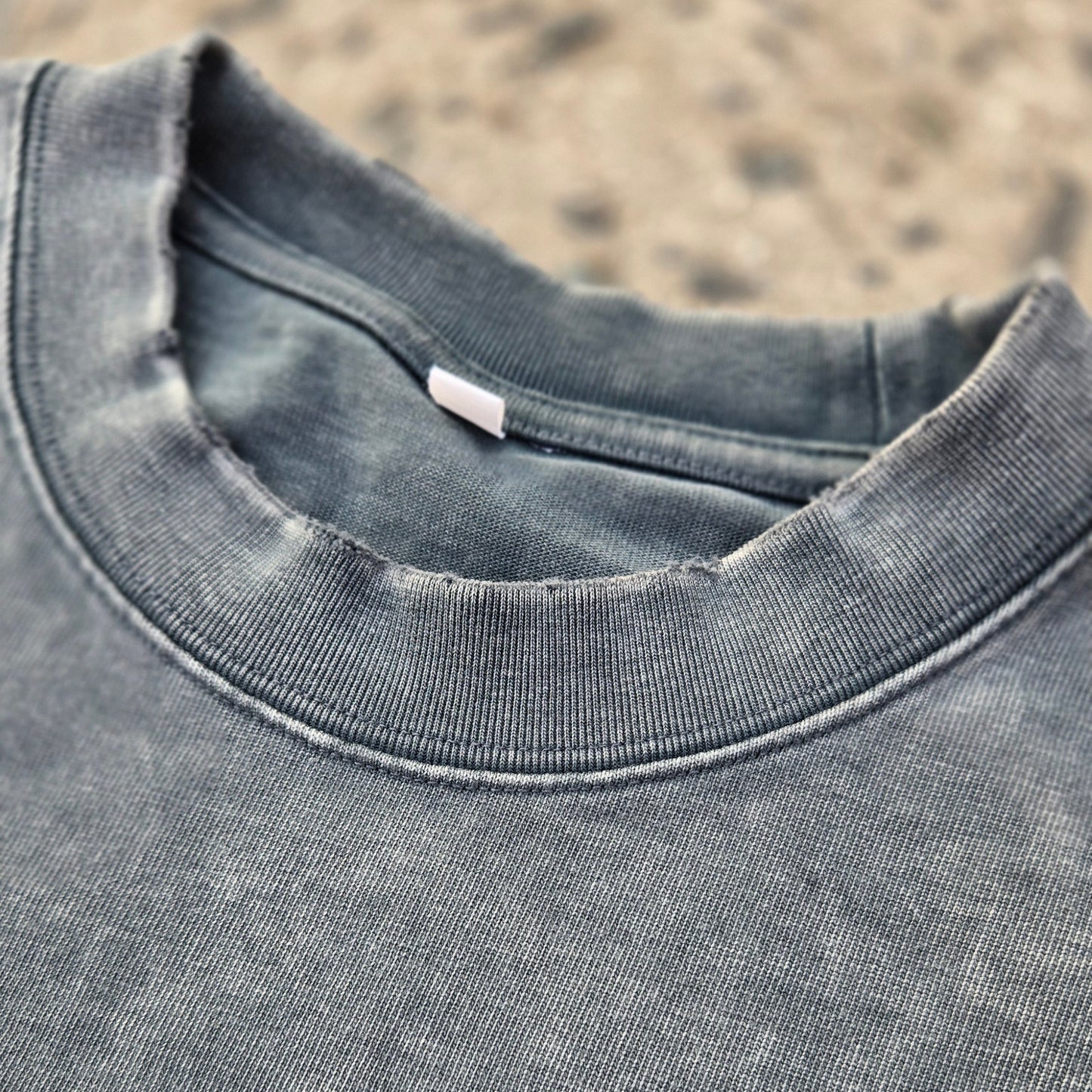 Existential snow wash tee crew neck with size label detail