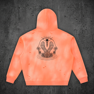 Back view of the Phantas Orange Enigma hoodie on sun-faded fleece, black line-art print of an all-seeing eye, moon phases, two mirrored profile faces and a pair of staircases meeting over a pool