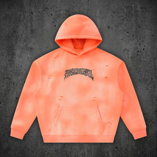Front of the Enigma sunfade frayed fleece hoodie in Phantas Orange, flat lay on concrete, 350 GSM poly-cotton fleece with a mottled sun-faded wash, frayed detailing, ribbed cuffs and hem, and the arched Phantasmagorical chest wordmark