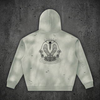 Back of the Light Gray Enigma sunfade hoodie showing the full Enigma line-art print, an open eye crowning two arched doorways whose staircases descend into rippling water