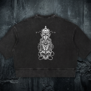 Paradigm mineral wash boxy raw-edge tee in black, showing the hand-cut raw edge and mineral wash texture