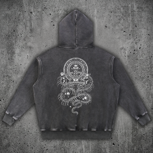 Back view of the DMT.exe 355 GSM snow wash fleece oversized hoodie from the Sacred Collection, featuring a heavy drop-shoulder drape and custom snake artwork.
