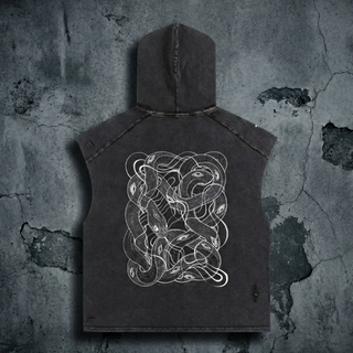 Charcoal snow wash Embrace The Chaos boxy hooded tank top, back view with hood up on concrete, printed with white tangled serpent line art.