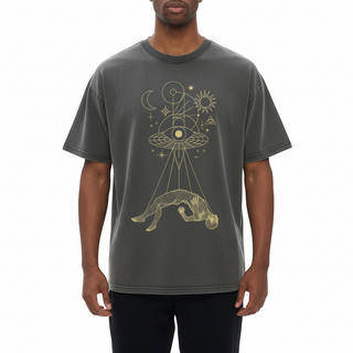 Front view of Dimensional Drift charcoal tee with gold celestial figure and eye graphic