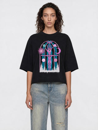 Model wearing the black Dissolution of Ego oversized boxy mineral wash sweater tee