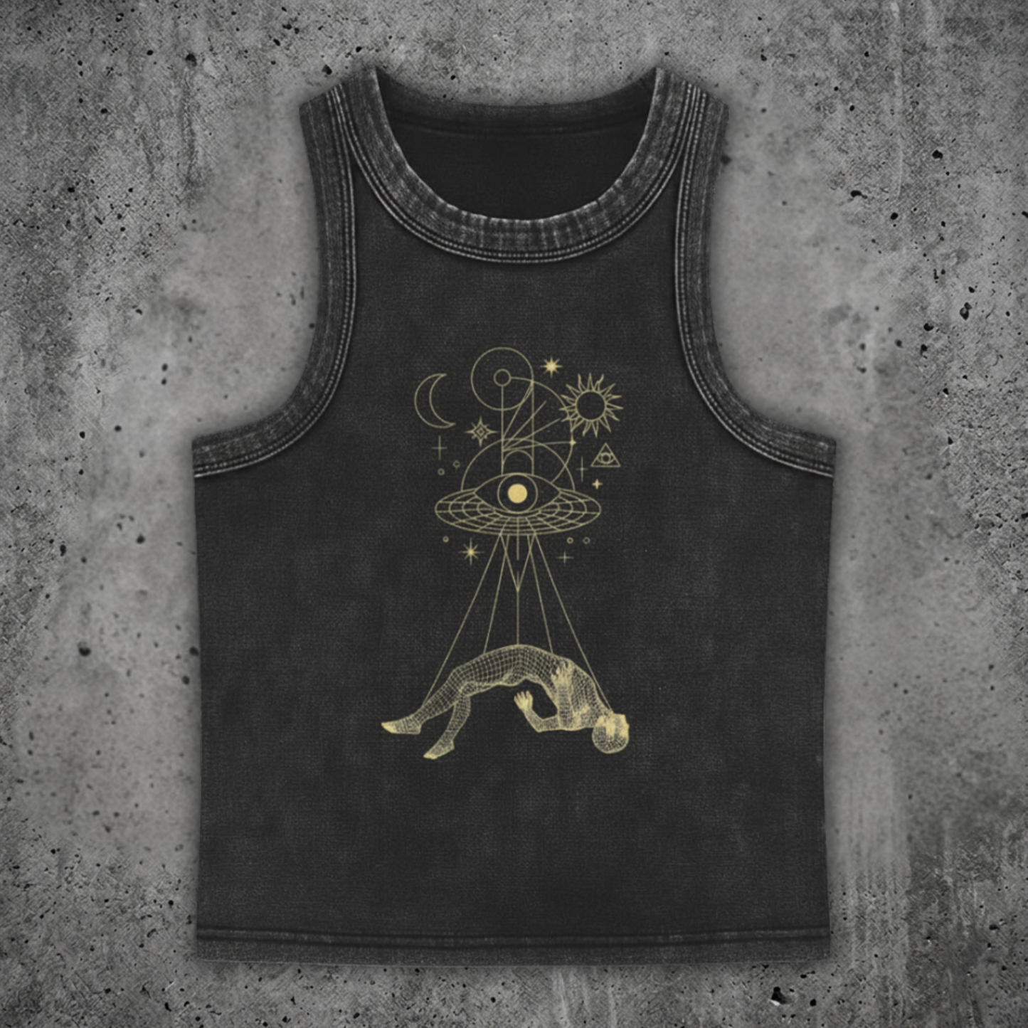 Black tank top with gold astrological design on a concrete surface