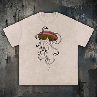Oatmeal Mushroom Lady tee on dark concrete, printed with a line-art female figure dancing beneath a maroon and olive mushroom cap, a Patakota special edition collab.