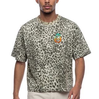 Person wearing a leopard print t-shirt with a colorful logo on a white background