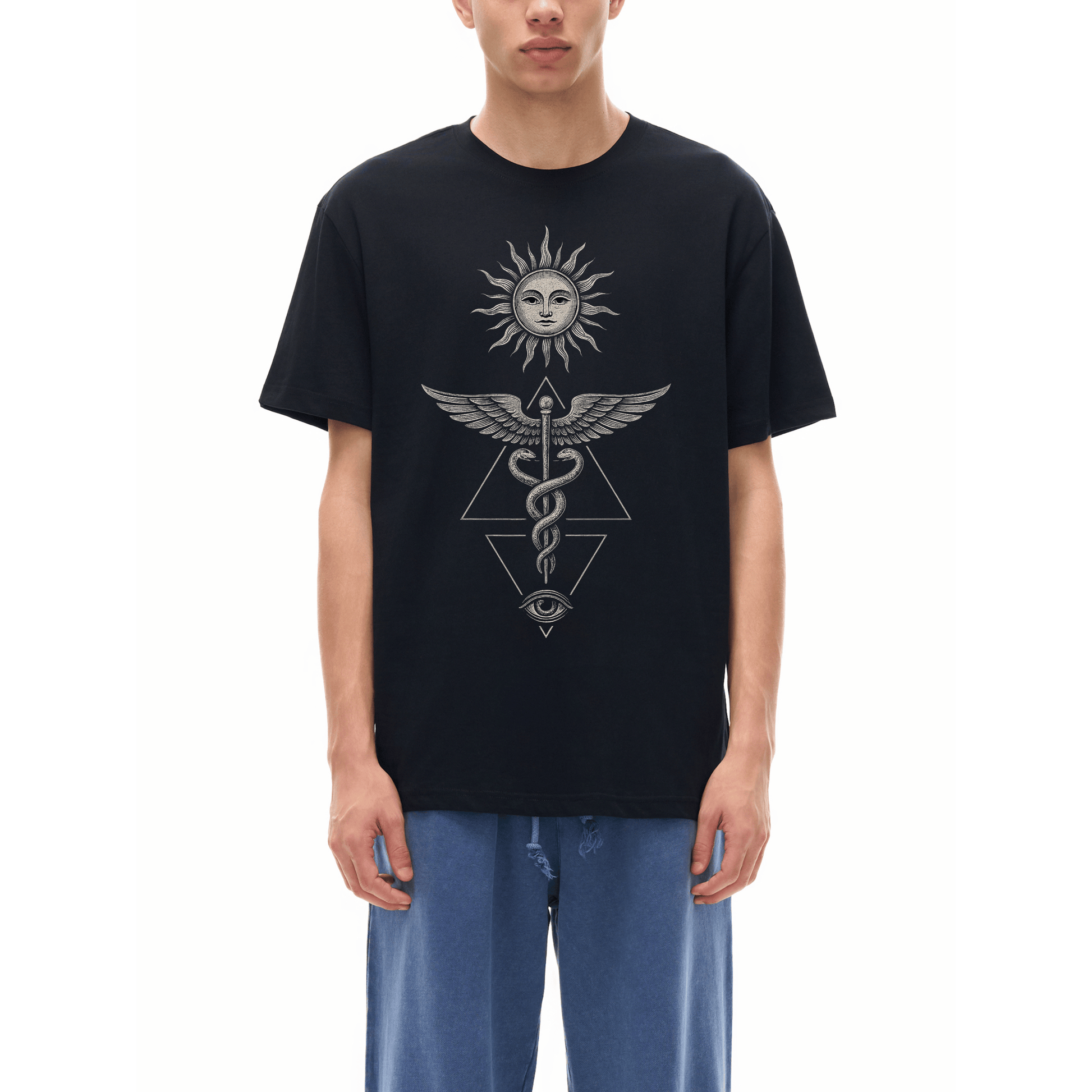 Model wearing black Inner Alchemy tee with sun face caduceus snakes and all-seeing eye graphic