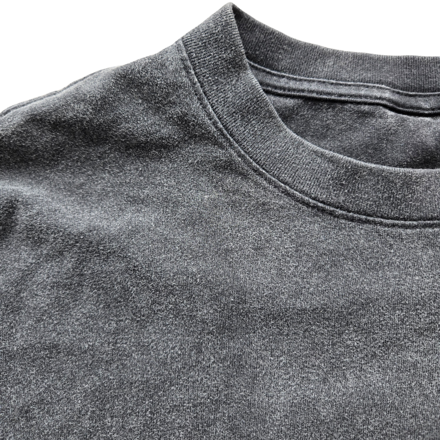 Close-up of acid-wash gray Inner Alchemy Fluffy Vintage tee neckline showing soft fabric and ribbed crew neck
