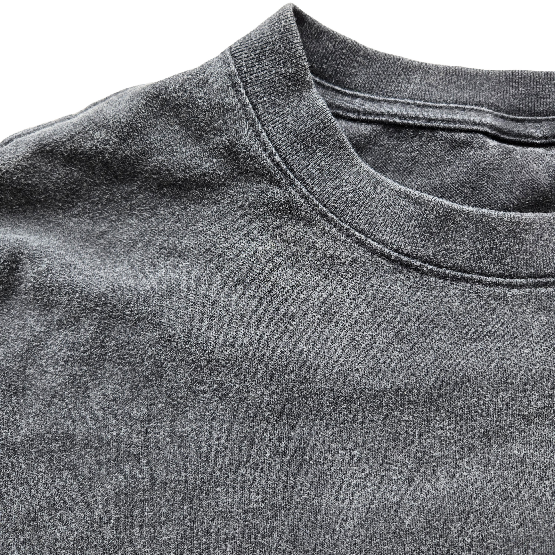 Close-up of acid-wash gray Inner Alchemy Fluffy Vintage tee neckline showing soft fabric and ribbed crew neck
