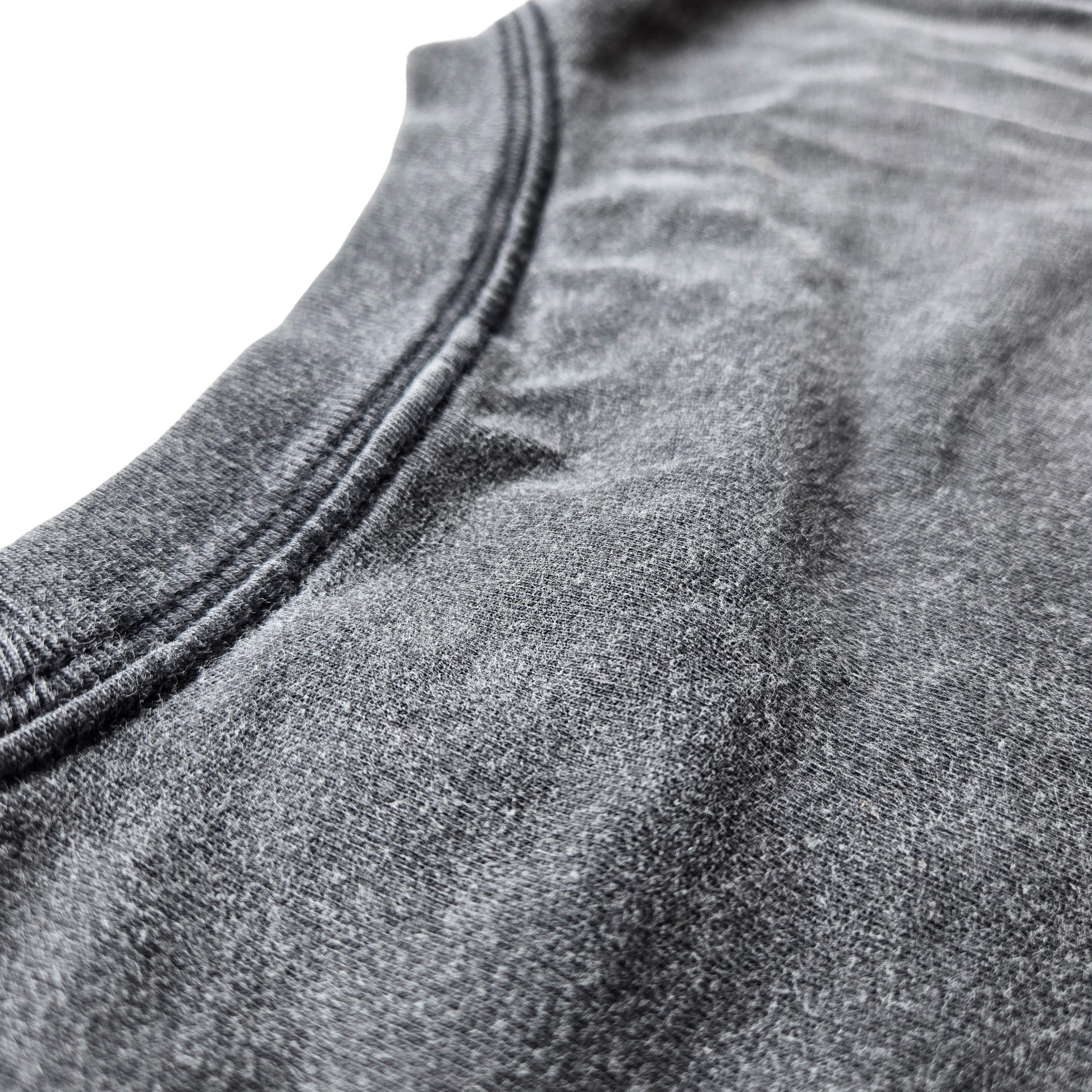 Detail of shoulder seam stitching on gray acid-wash Inner Alchemy Fluffy Vintage tee quality construction