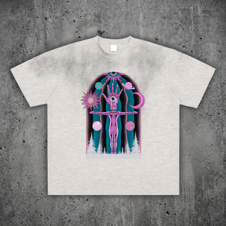 Heather oatmeal Dissolution of Ego vintage wash frayed tee on concrete, printed with a pink and teal surreal figure reaching out beneath an eye-in-hand, sun, moon and planets.