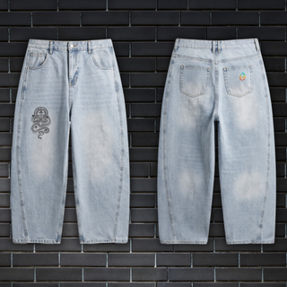 DMT.exe barrel leg jeans - detail of vintage sunfade wash and frayed denim