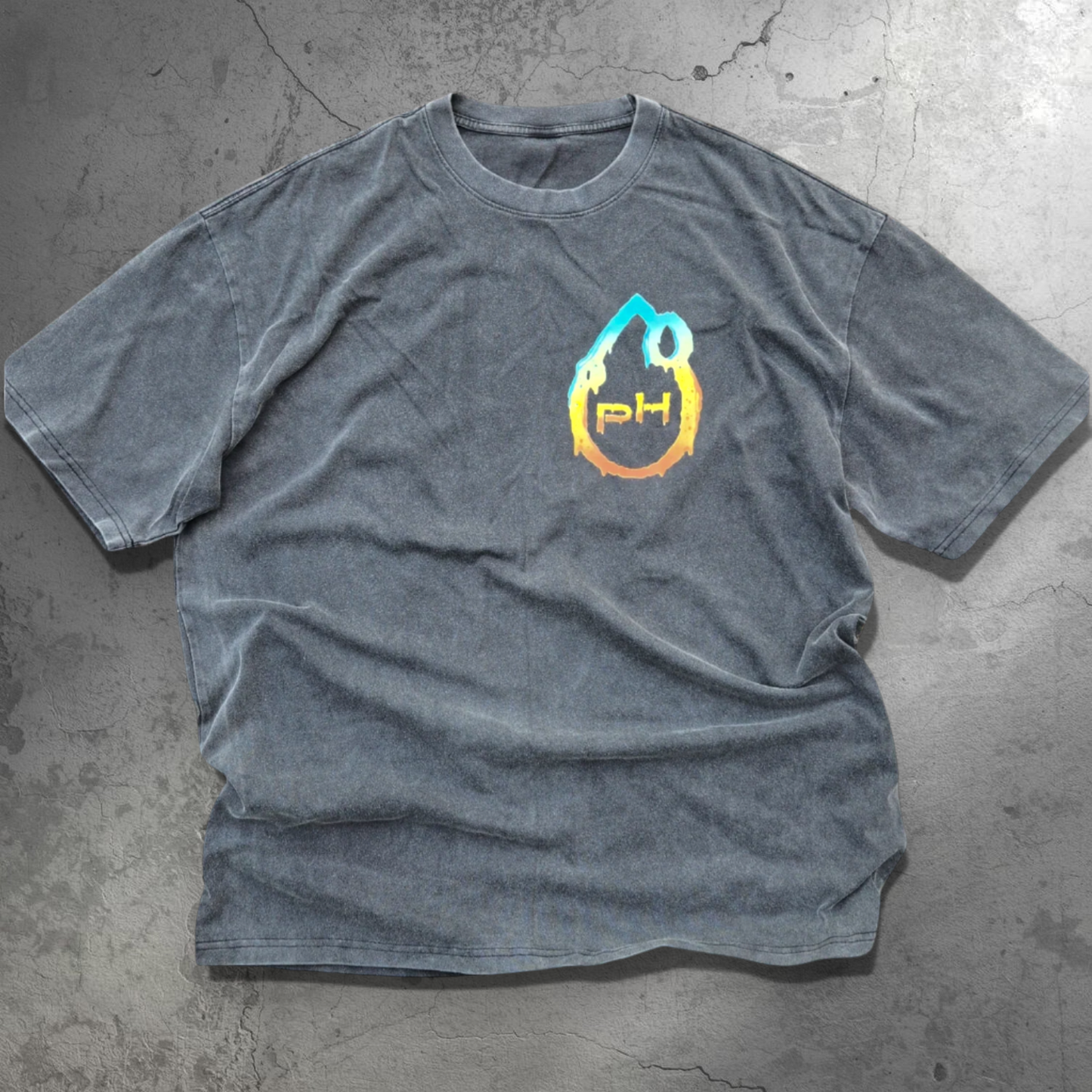 Gray t-shirt with a colorful logo on a white surface