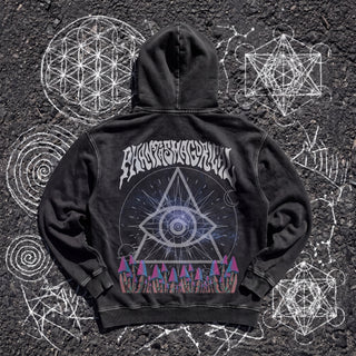 Back of the Cosmic Geometry snow washed heavyweight cotton hoodie in Black Beauty, styled on dark asphalt covered in white chalk sacred geometry, showing the wavy Phantasmagorical lettering, the all-seeing eye triangle over a starry cosmic circle and a row of pink, blue and purple mushrooms.
