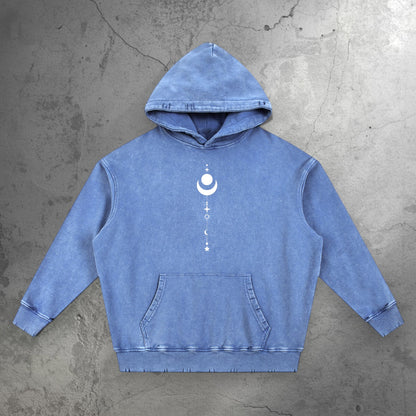 Blue Existential snow wash hand-frayed hoodie front view with celestial moon and stars graphic