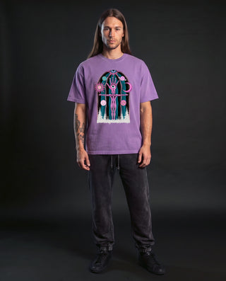 Model wearing the Dissolution of Ego vintage washed relaxed fit tee in Purple, front view, showing the full front artwork.