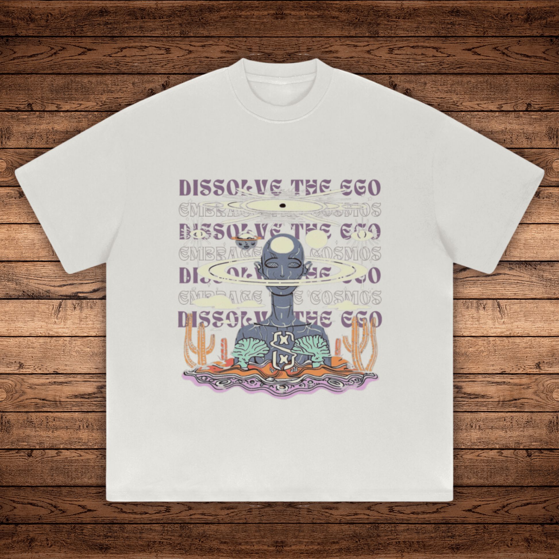 Oat gray Dissolve The Ego Absurdly Heavyweight tee flat lay with meditating figure and cacti