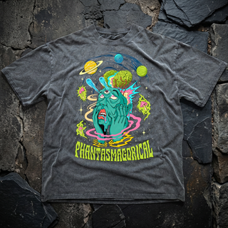 Charcoal Intergalactic Mindmelt fluffy vintage heavyweight tee on dark stone, printed with a colorful melting teal alien, orbiting planets, mushrooms and a green Phantasmagorical wordmark.