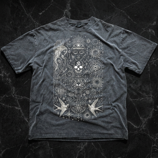 Heather charcoal Ethereal Muse fluffy vintage tee on black marble, printed in white with a flowing-haired muse, all-seeing eye, om skull, sun, sacred geometry and swallows.