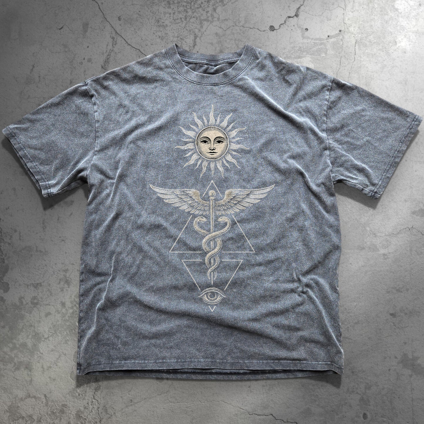 Inner Alchemy Fluffy Vintage tee in acid-wash gray with sun face caduceus wings and all-seeing eye design