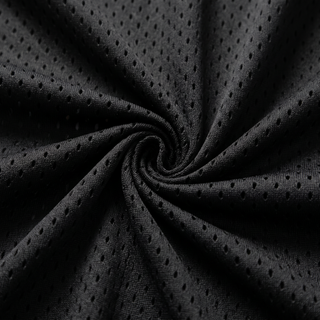 Black polyester mesh twisted into a spiral, showing the drape and open weave of the 145 GSM fabric