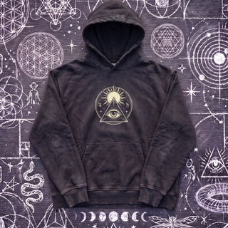 Black Celestial Synthesis hand-frayed hoodie from the 3-Piece Set, front view, laid flat on chalk sacred geometry.