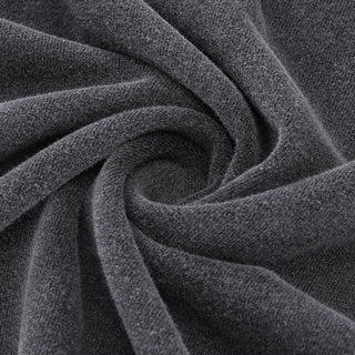 Charcoal gray soft cotton jersey fabric swirled to show smooth fluffy Yin Yang tee texture