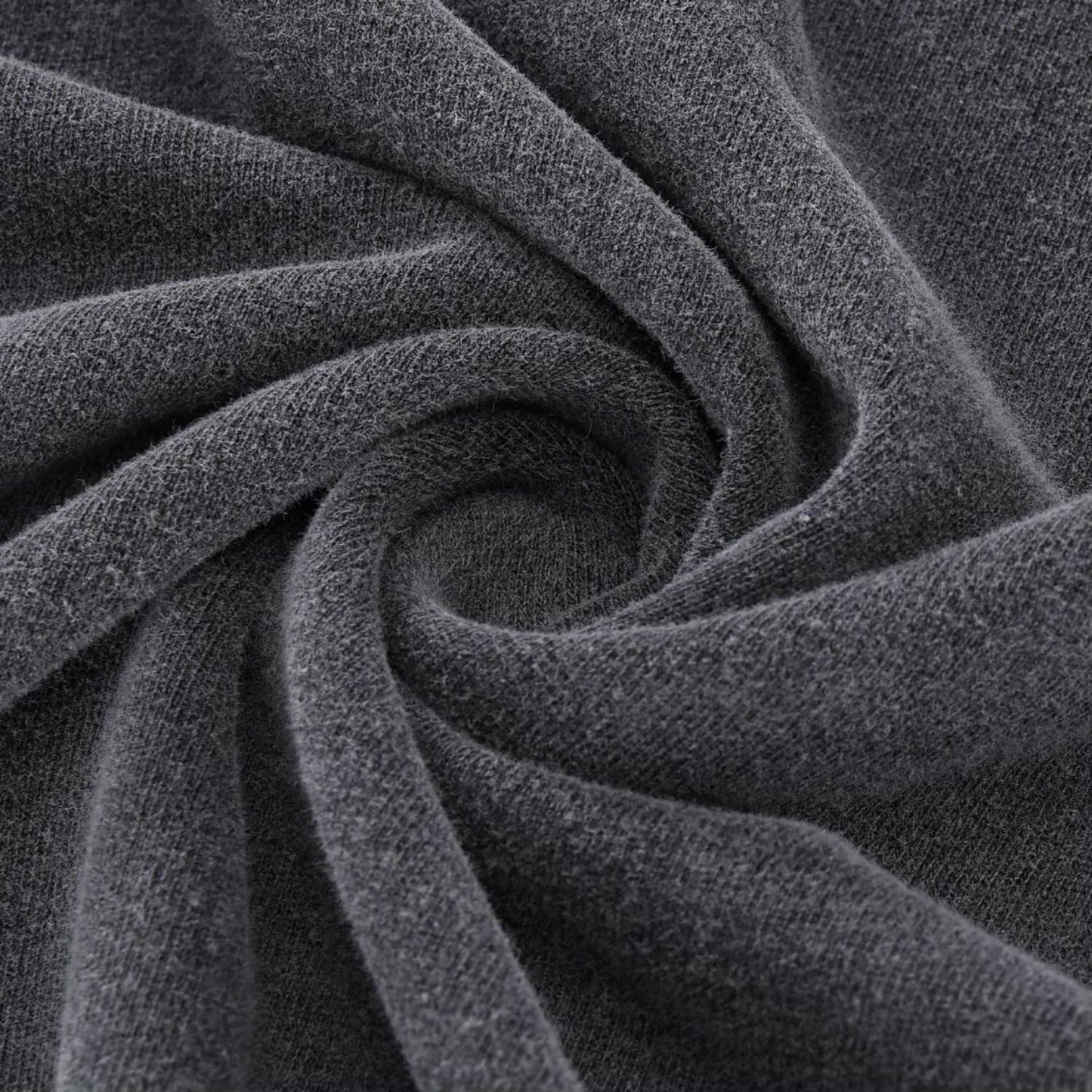 Close-up of Paradigm FV tee hem stitching on charcoal wash fabric