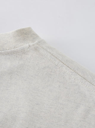 Open Your Mind black 425 GSM tee shoulder seam close-up showing reinforced stitching