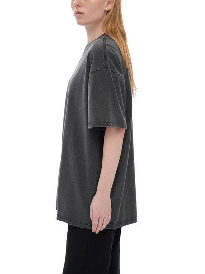 Side profile of woman wearing charcoal Ethereal Muse fluffy vintage tee showing relaxed oversized fit