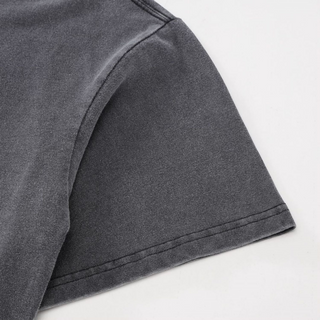Dropped shoulder and sleeve hem detail of Metamorphosis tee