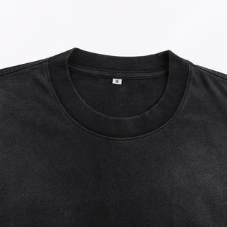 Void Eclipse sunfaded tee crew neck detail showing ribbed collar on washed black heavyweight cotton