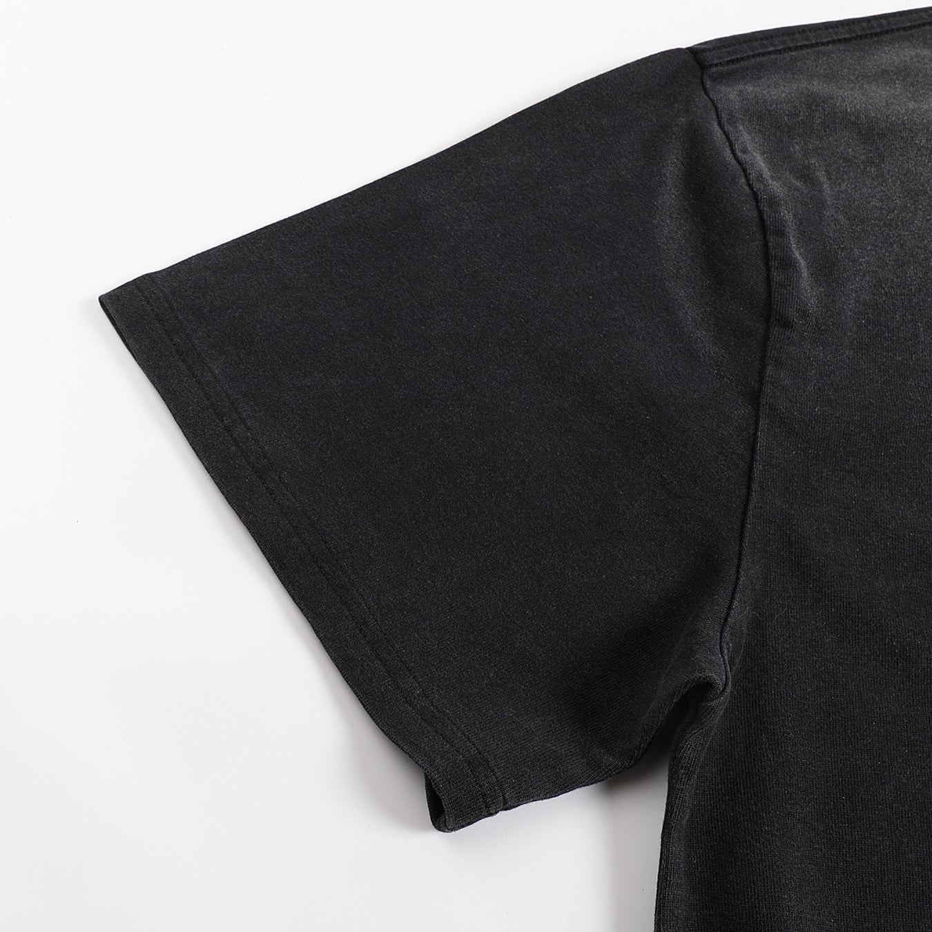 Void Eclipse tee drop shoulder and short sleeve seam construction detail on 280 GSM sunfaded cotton