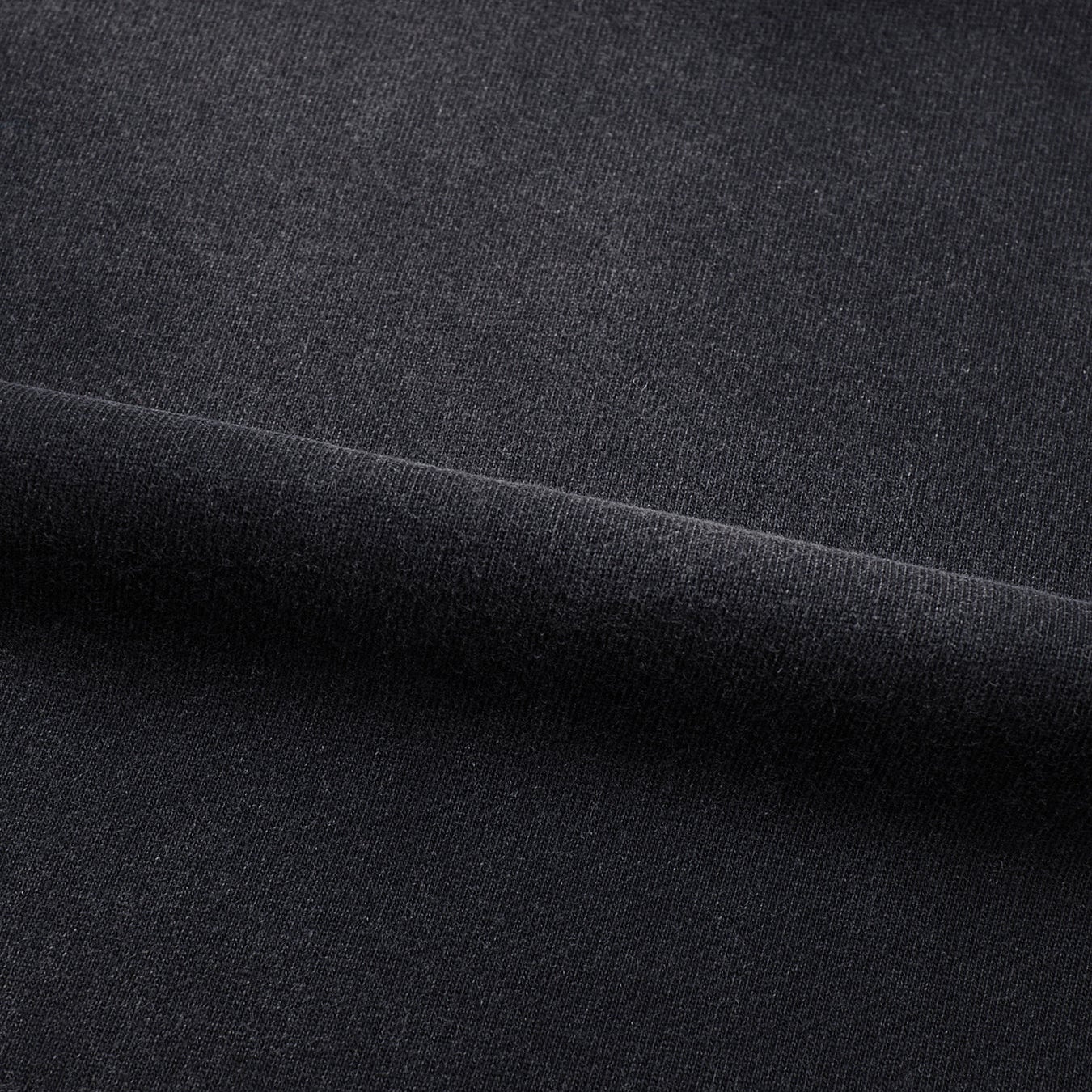 Void Eclipse heavyweight 280 GSM sunfaded cotton fabric texture and seam stitching close-up