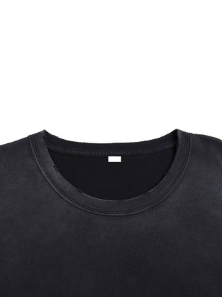 Close-up of the ribbed crew neckline on the vintage black gray tee, showing hand-frayed distressing along the collar seam