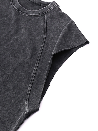 Close-up of charcoal Inner Alchemy snow wash tank showing raw-cut armhole and neckline