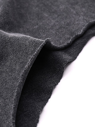 Close-up of raw hem bottom edge on Dimensional Drift snow wash tank