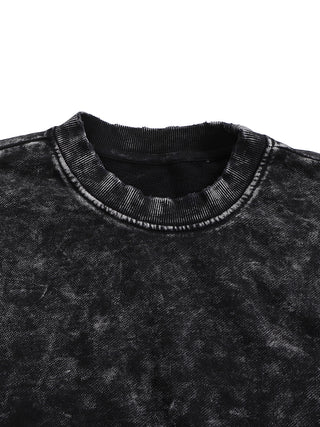 Close-up of black snow wash Paradigm sweatshirt neckline showing hand-frayed detail