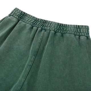 Close-up of green Existential Joggers rear elastic waistband detail