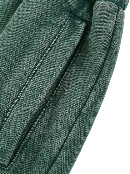 Paradigm snow wash jogger close-up of green fabric seam detail