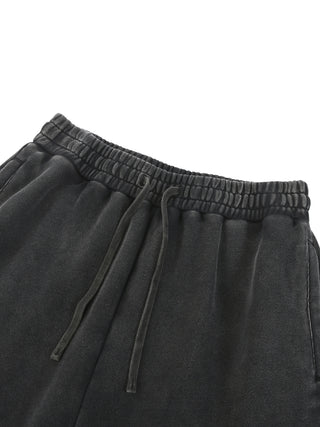 Paradigm Snow Wash Baggy Sweatpants close-up of elastic drawstring waistband in dark gray